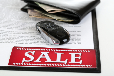 Tablet, purse and automatic key for car isolated on whiteの写真素材