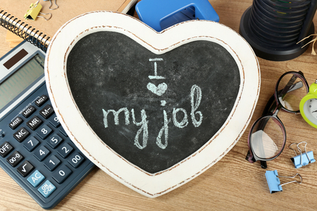 Inscription on blackboard I love my job on workplaceの写真素材