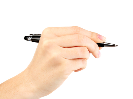 Female hand with pen isolated on whiteの写真素材
