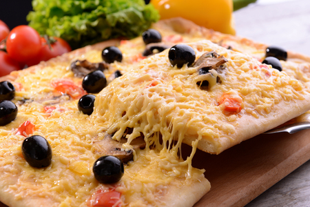 Delicious homemade pizza on table close-upの写真素材