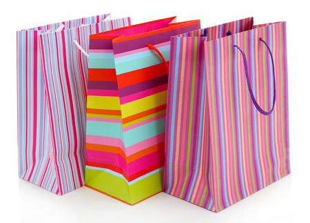 Colorful shopping paper bags isolated on whiteの写真素材
