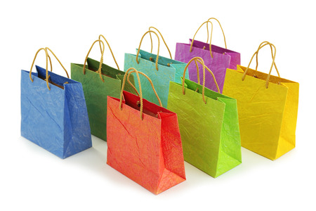 Colorful shopping paper bags isolated on whiteの写真素材