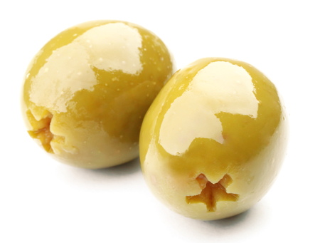 Green olives isolated on whiteの写真素材