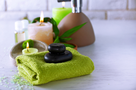 Beautiful composition of spa treatment on white wooden tableの写真素材