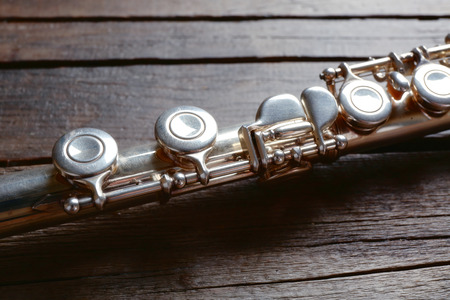 Flute on wooden backgroundの写真素材
