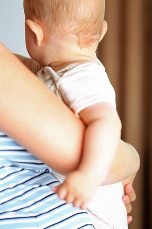 Child and mother hand, closeupの写真素材