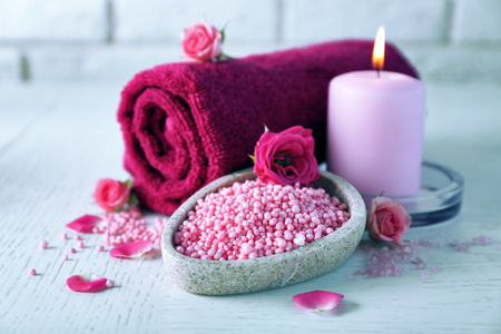 Beautiful composition of spa treatment on white wooden tableの写真素材