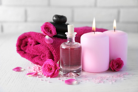 Beautiful composition of spa treatment on white wooden tableの写真素材