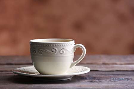 Cup of coffee on blurred backgroundの写真素材