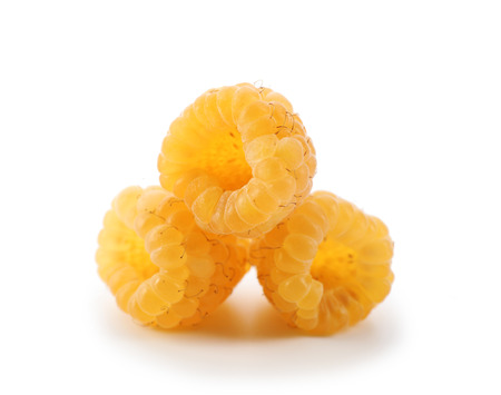Yellow raspberries isolated on white