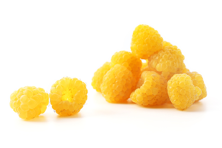 Yellow raspberries isolated on white