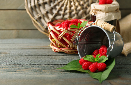 Sweet raspberries on wooden  background