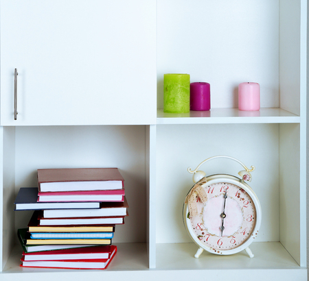 Beautiful white shelves with different home objectsの写真素材