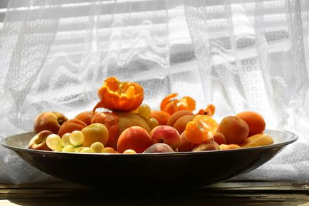 Heap of fresh fruits on fabric backgroundの写真素材