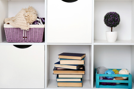 Beautiful white shelves with different home objectsの写真素材