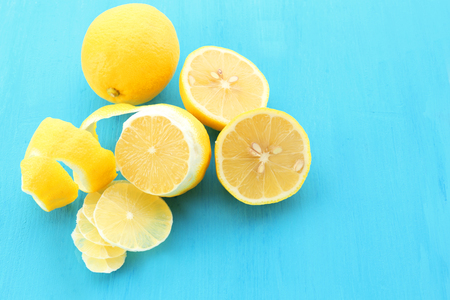 Ripe lemons on wooden table close upの写真素材