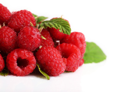 Fresh raspberries isolated on white