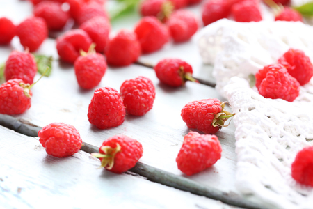 Fresh raspberries on wooden table, closeupの写真素材