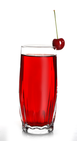 Glass of cherry juice isolated on whiteの写真素材