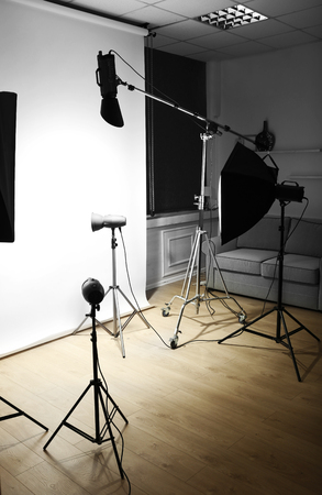 Empty photo studio with lighting equipmentの写真素材