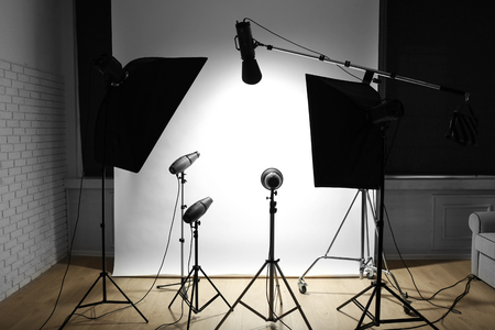 Empty photo studio with lighting equipmentの写真素材