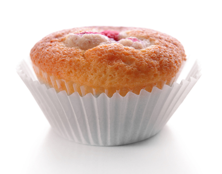 Delicious cupcake with berries isolated on whiteの写真素材