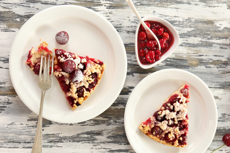 Tasty homemade pie with cherries on table close upの写真素材