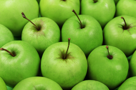 Ripe green apples close upの写真素材
