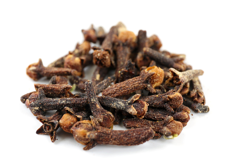 Pile of dried spice isolated on whiteの写真素材