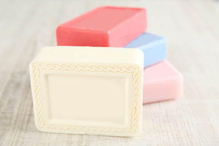 Bars of natural soap on light backgroundの写真素材