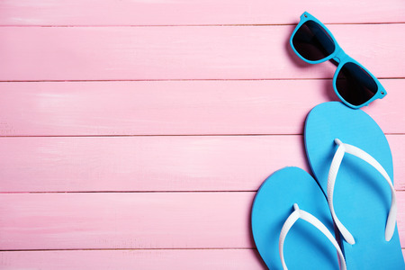 Summer items on wooden backgroundの写真素材