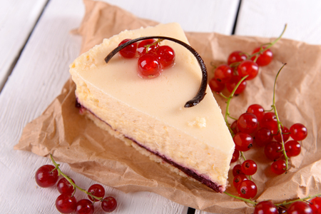 Tasty cheesecake with berries on table close upの写真素材