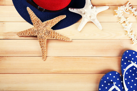 Summer items on wooden backgroundの写真素材