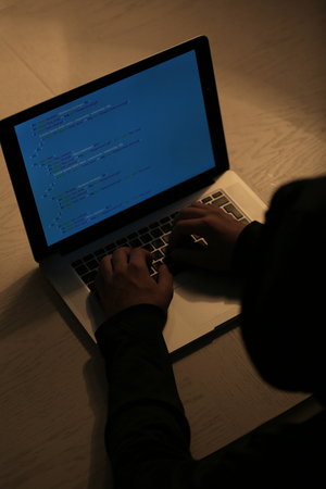 Hacker with laptop 