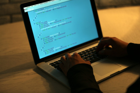 Hacker with laptop 