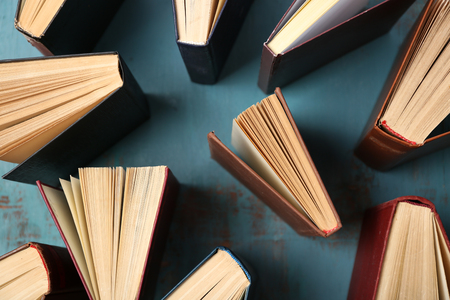 Heart of books, on wooden backgroundの写真素材