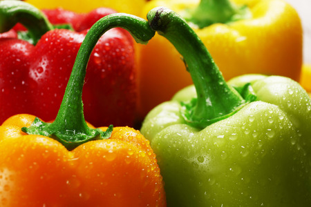 Group of wet colorful peppers, closeup