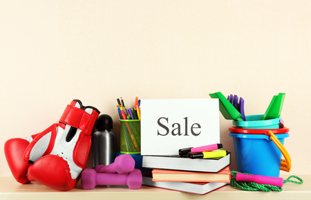 Goods for sale, on light wall backgroundの写真素材