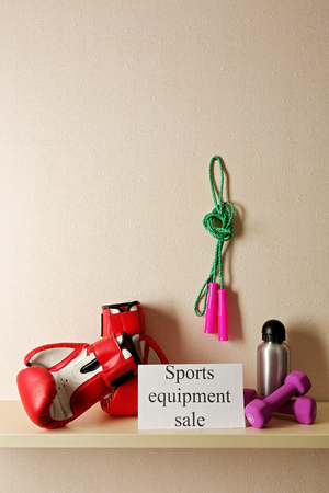 Sport goods for sale, on light wall backgroundの写真素材