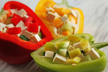 Fresh green salad in pepper on table close upの写真素材