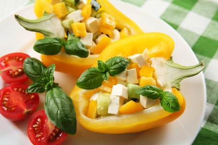 Fresh green salad in pepper on table close upの写真素材