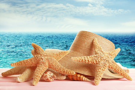 Summer accessories on sea backgroundの写真素材