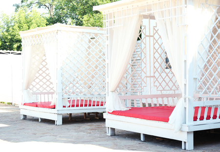 Lounge zone near swimming pool, outdoorの写真素材