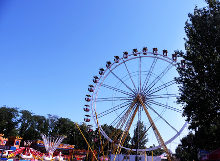 Ferris wheel over blue skyの写真素材
