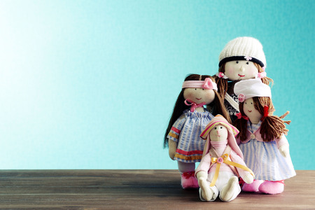 Dolls on blue backgroundの写真素材