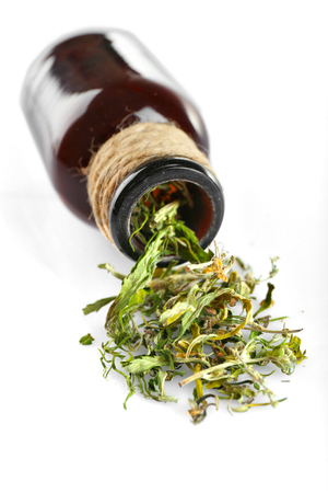 Bottle of dry medical cannabis isolated on whiteの写真素材