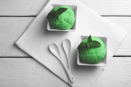Homemade mint ice-cream on light wooden backgroundの写真素材