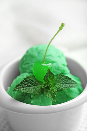 Homemade mint ice-cream on light wooden backgroundの写真素材