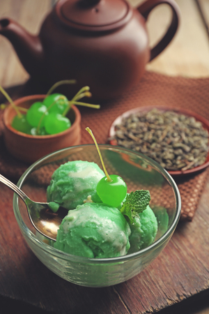 Homemade Green tea ice-cream on dark wooden backgroundの写真素材