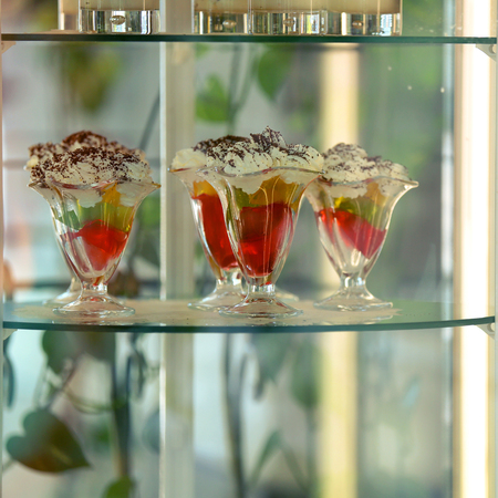 Showcase with desserts close upの写真素材